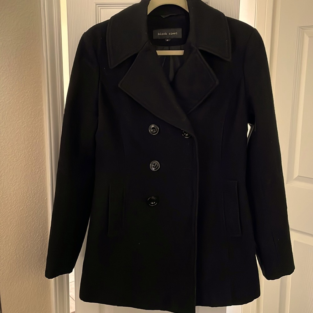 Black Rivet size M jacket. Great for chilly nights and works with any style
